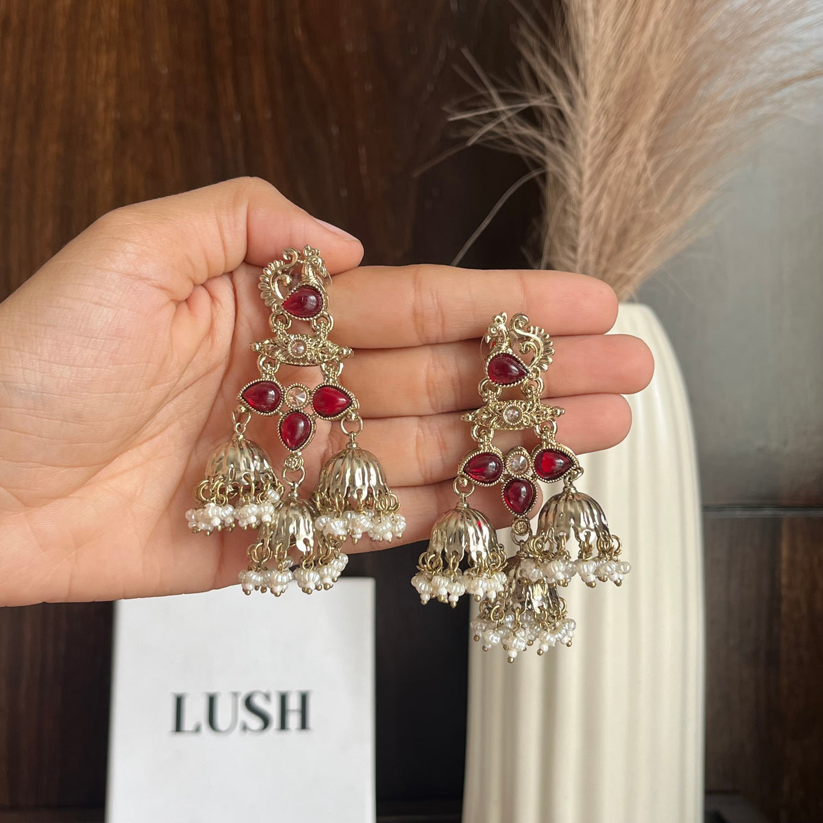 Regal Peacock Triple Jhumka Earrings